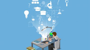 Człowiek siedzący przed laptopem, który wyśietla hologram z ikonami możliwości